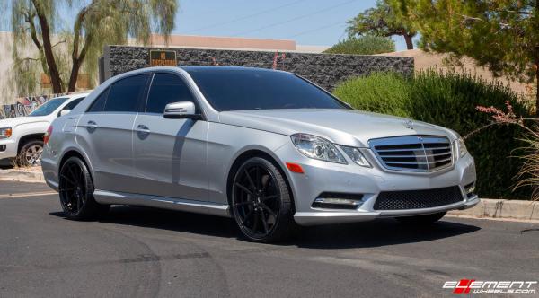 Staggered 20 Inch Variant Argon in Gloss Piano Black on a 2013 Mercedes Benz E550 Sedan