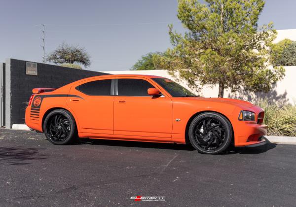 22 inch Staggered Lexani Turbine Gloss Black on a 2009 Dodge Charger SRT