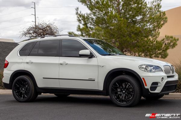 20 inch Staggered Variant Radon Gloss Piano Black on a 2013 BMW X5