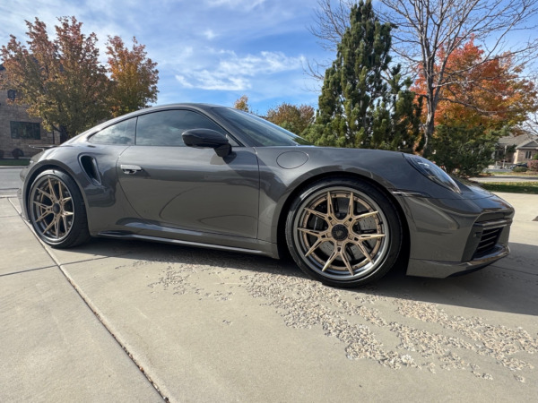 Staggered 20/21 inch Variant Nysa 2P in Satin Bronze w/ Gloss Gunmetal Lip on a 2022 Porsche 992 911 Turbo S