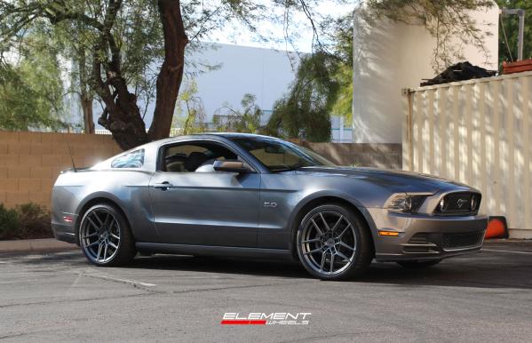 20 inch Staggered Variant Helium Gloss Gunmetal on a 2014 Ford Mustang GT