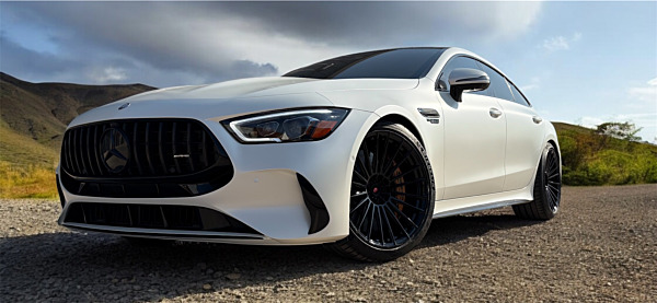 Staggered 21 inch Vossen S17-04 in Gloss Black on a 2024 Mercedes AMG GT63S w/ Carbon Ceramics
